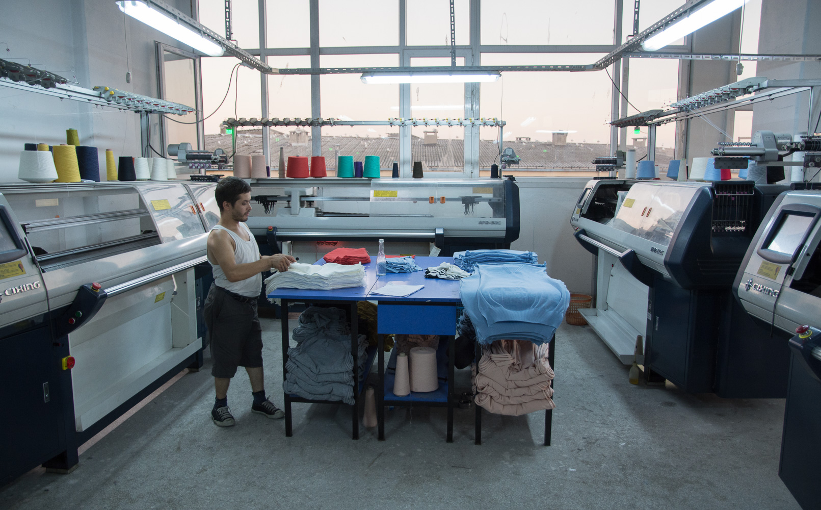 A small independent factory set up by a former garment worker, making fake brand clothing