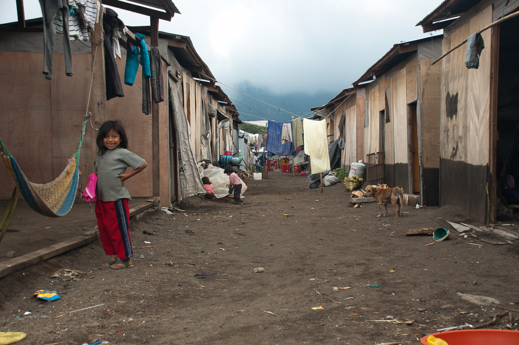 The village of Panabaj experienced a massive mudslide with several casualties. Years later the villagers still lived in temporary shacks.