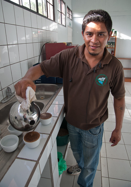 Noel preparing coffee for export